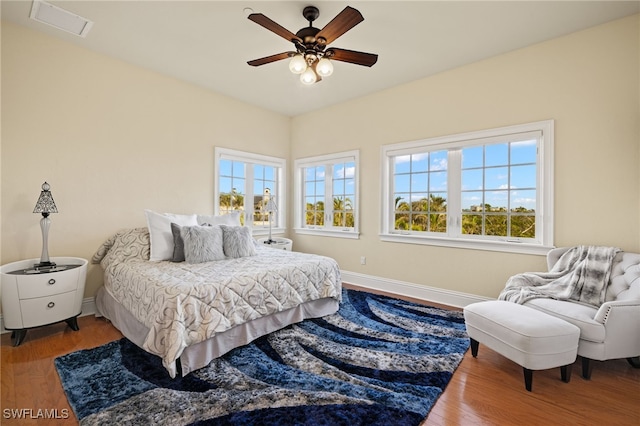 bedroom featuring ceiling fan and wood-type flooring