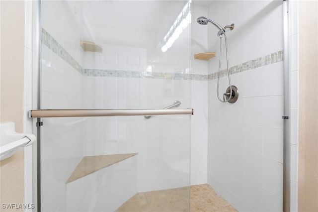 bathroom featuring an enclosed shower