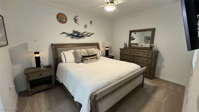 carpeted bedroom featuring ceiling fan and ornamental molding