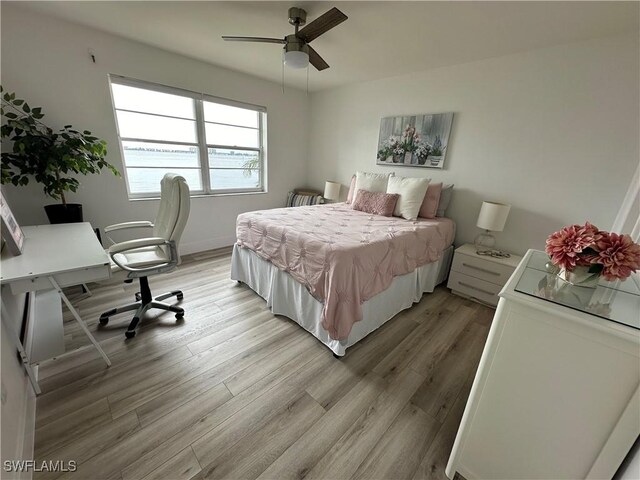 1900 Clifford St Unit 201, Fort Myers, FL 33901 - bedroom with light wood-style floors and ceiling fan