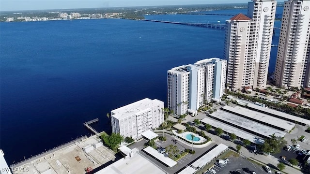 birds eye view of property featuring a water view