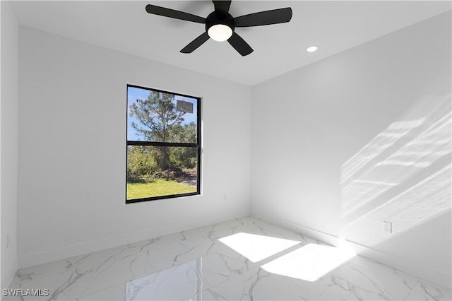 unfurnished room with ceiling fan