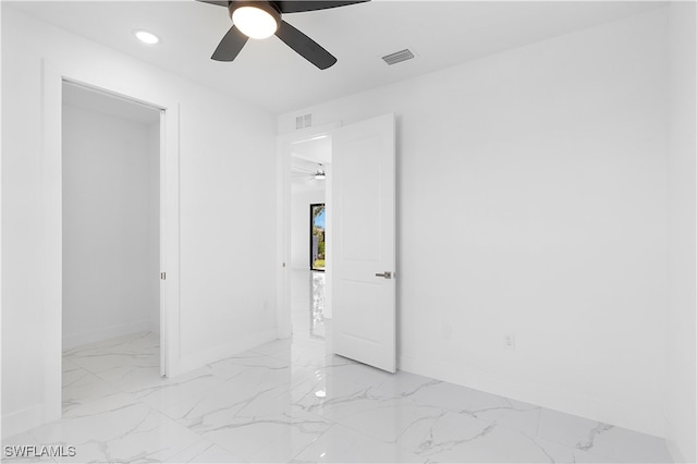 unfurnished room featuring ceiling fan