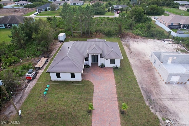 2517 11th St SW, Lehigh Acres, FL 33976 - aerial perspective of suburban area