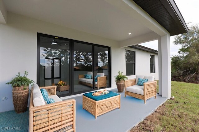2517 11th St SW, Lehigh Acres, FL 33976 - view of patio / terrace with an outdoor hangout area