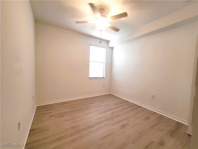 unfurnished room with ceiling fan and light hardwood / wood-style flooring