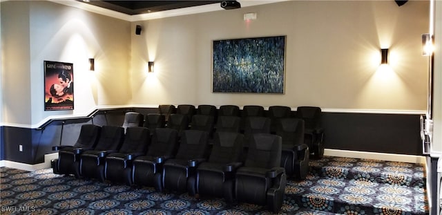 home theater featuring carpet and crown molding