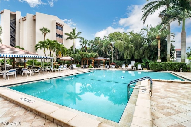4140 Steamboat Bnd E Unit 502, Fort Myers, FL 33919 - community pool with a gazebo and a patio area