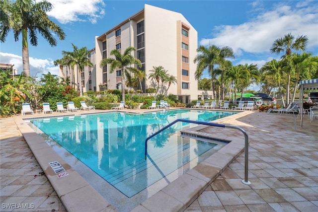 view of swimming pool featuring a patio area