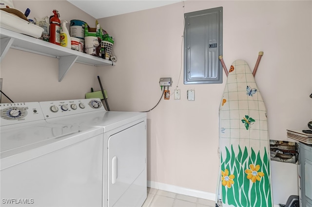 clothes washing area featuring separate washer and dryer and electric panel