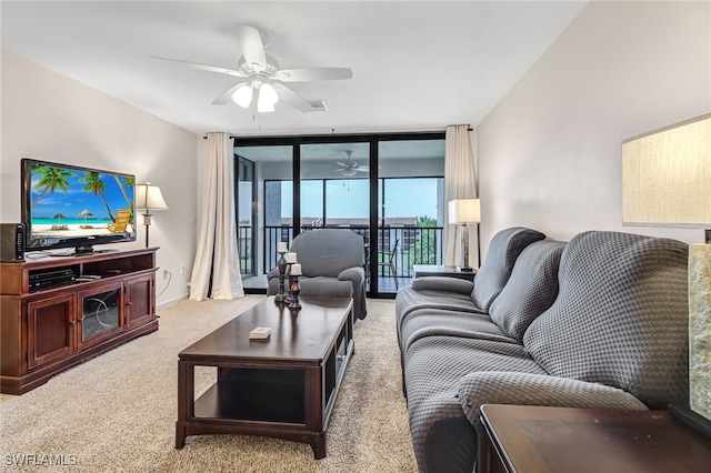 4140 Steamboat Bnd E Unit 502, Fort Myers, FL 33919 - living room featuring ceiling fan, floor to ceiling windows, and carpet flooring