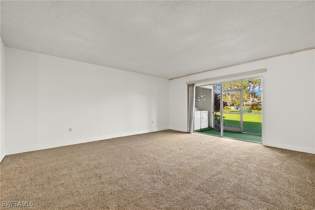 7068 Nantucket Cir Unit 3, North Fort Myers, FL 33917 - carpeted empty room with washer and dryer and a textured ceiling