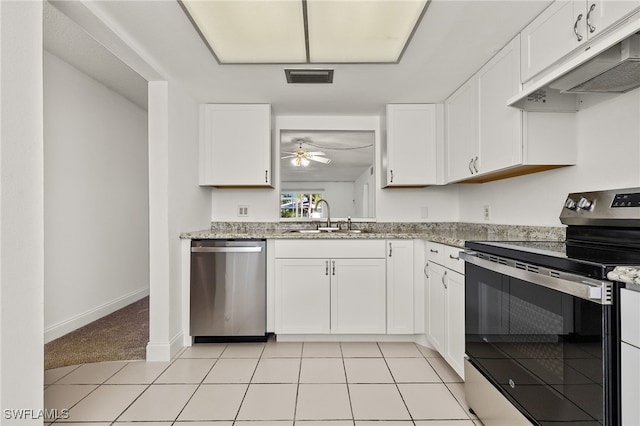 kitchen featuring ceiling fan, white cabinetry, sink, and appliances with stainless steel finishes