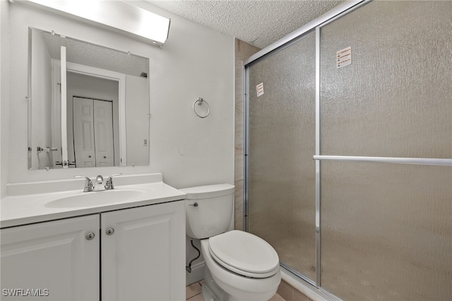 7068 Nantucket Cir Unit 3, North Fort Myers, FL 33917 - bathroom with vanity, a shower stall, and a textured ceiling