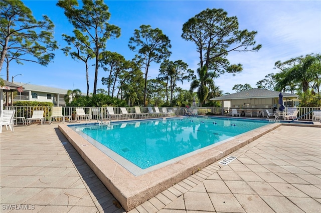7068 Nantucket Cir Unit 3, North Fort Myers, FL 33917 - community pool with a patio