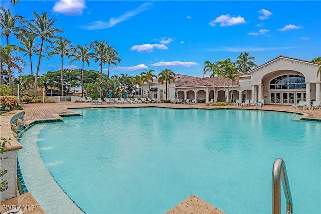 view of pool featuring a patio area