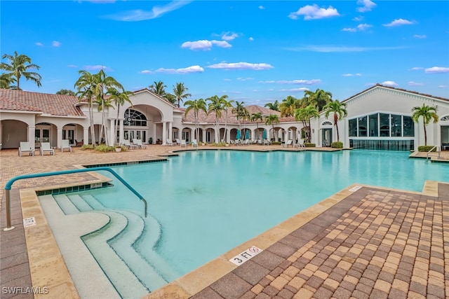 view of pool featuring a patio