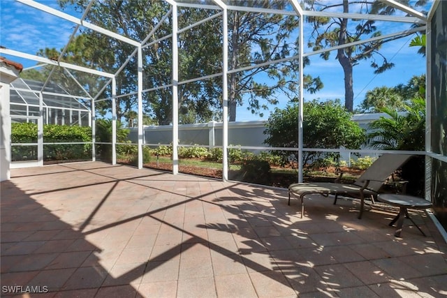 unfurnished sunroom with a swimming pool