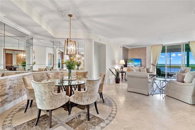 285 Grande Way Unit 705, Naples, FL 34110 - dining area with a chandelier, crown molding, and expansive windows
