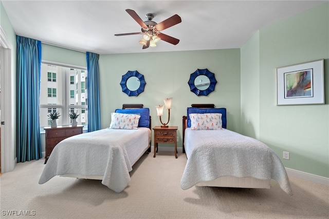 285 Grande Way Unit 705, Naples, FL 34110 - carpeted bedroom with a ceiling fan and baseboards