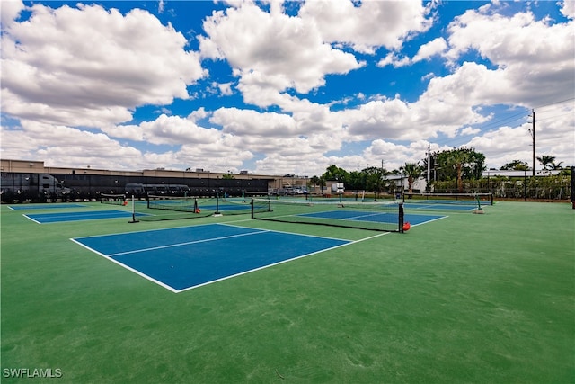 view of sport court with basketball hoop