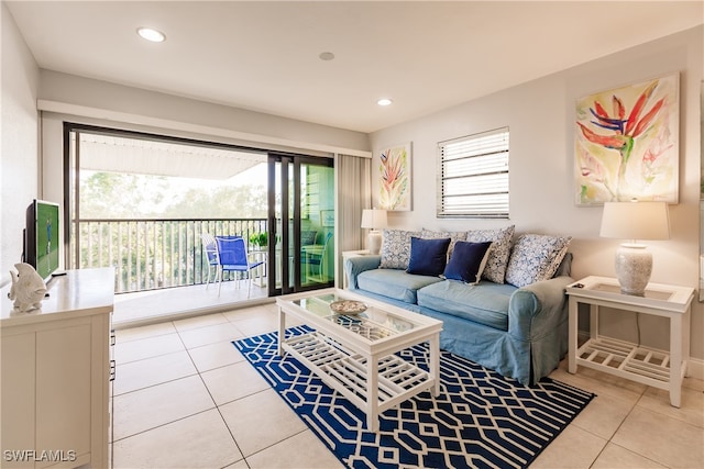 tiled living room with plenty of natural light