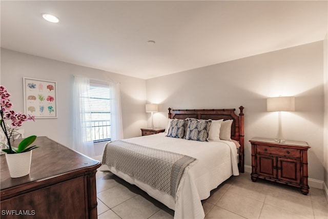 bedroom featuring light tile patterned floors