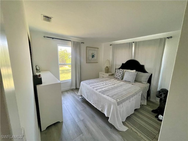 bedroom featuring hardwood / wood-style floors