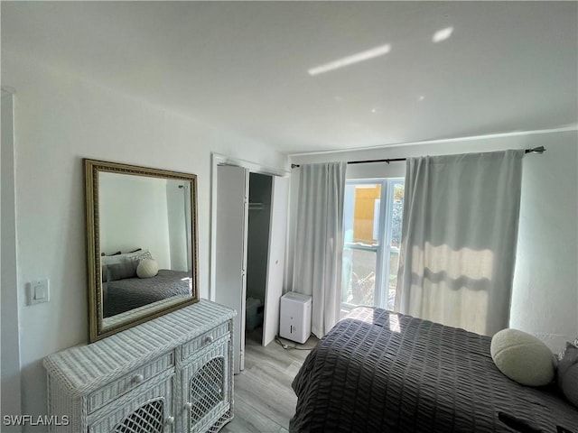 bedroom featuring light hardwood / wood-style flooring