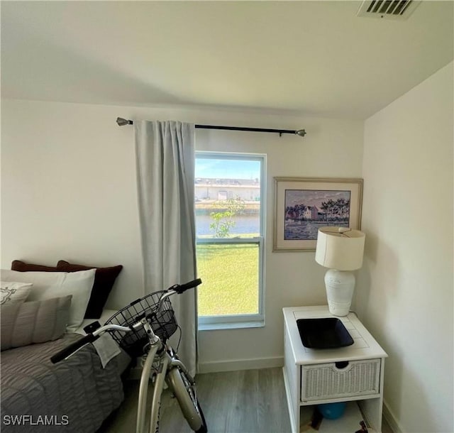 bedroom with light hardwood / wood-style floors