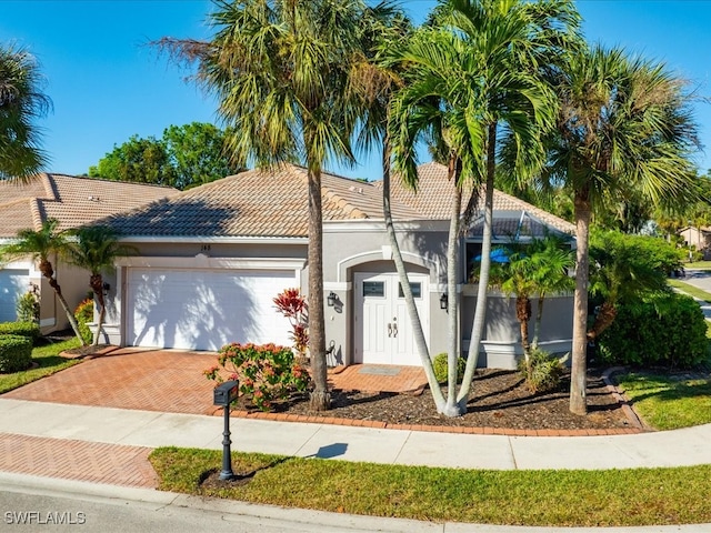 view of front of home with a garage