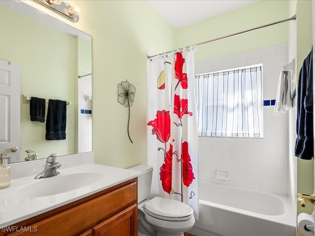 full bathroom with vanity, toilet, and shower / bath combo