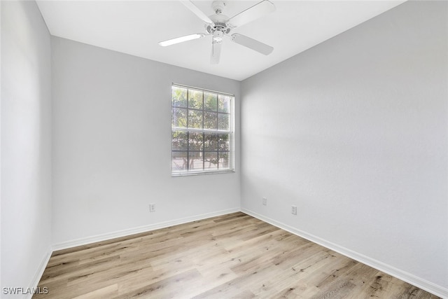 unfurnished room featuring light wood-type flooring and ceiling fan