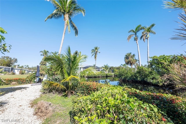 view of home's community featuring a water view