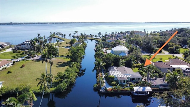 drone / aerial view with a water view