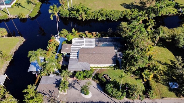 birds eye view of property featuring a water view