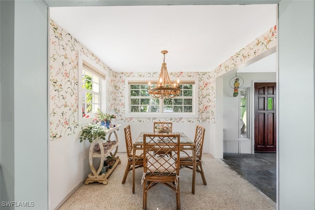 dining area with a notable chandelier