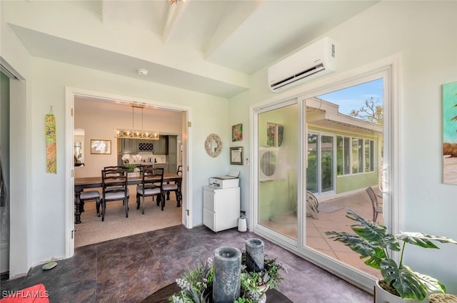 sunroom / solarium with a wall mounted AC