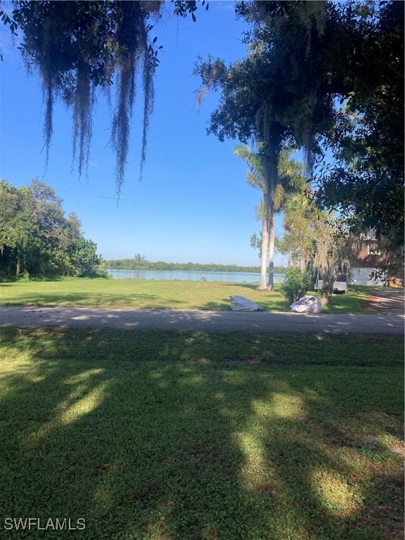 view of yard with a water view