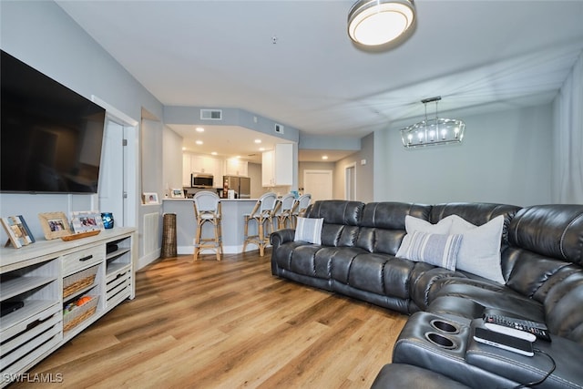 living room featuring light wood-type flooring