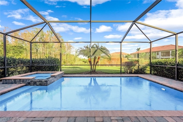 view of swimming pool with a lanai and an in ground hot tub