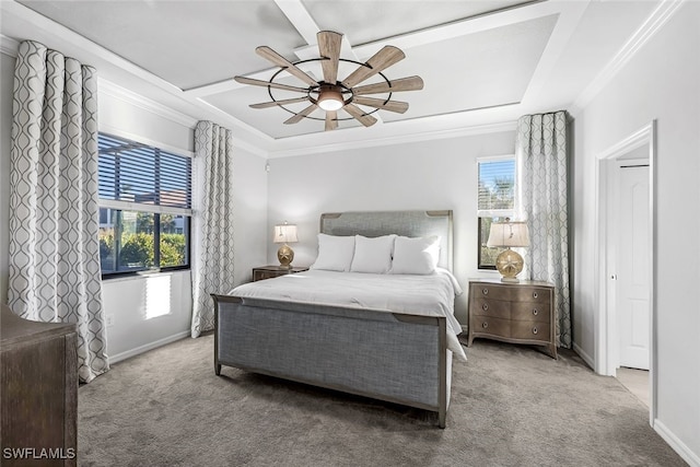 carpeted bedroom with ceiling fan and ornamental molding