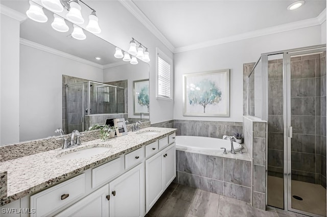 bathroom featuring hardwood / wood-style flooring, vanity, ornamental molding, and independent shower and bath