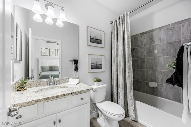 full bathroom featuring vanity, toilet, and shower / bath combo with shower curtain