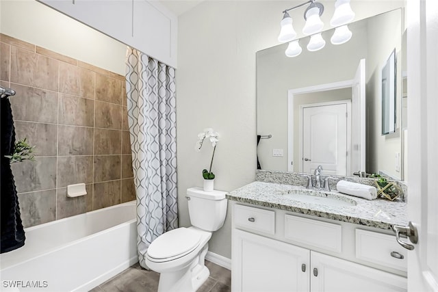 full bathroom featuring shower / tub combo, vanity, and toilet