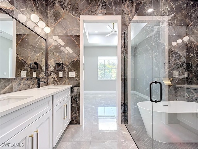 bathroom featuring vanity, tile walls, and independent shower and bath