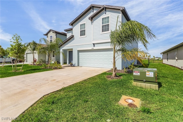 view of front of home with a garage and a front yard