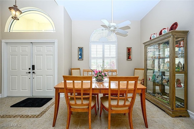 dining room featuring ceiling fan