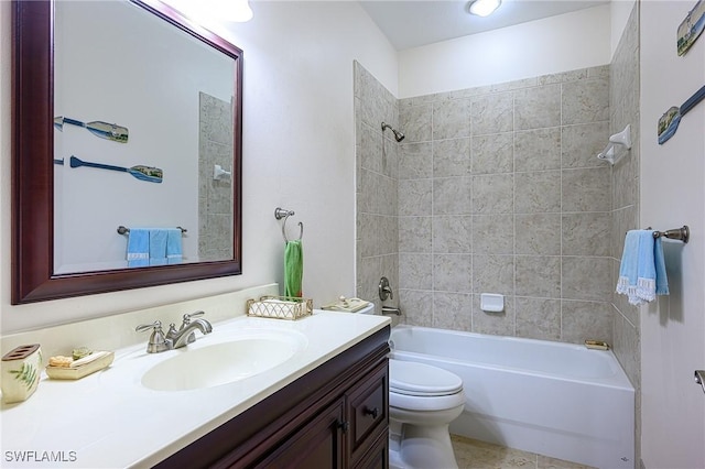 full bathroom featuring vanity, toilet, and tiled shower / bath combo