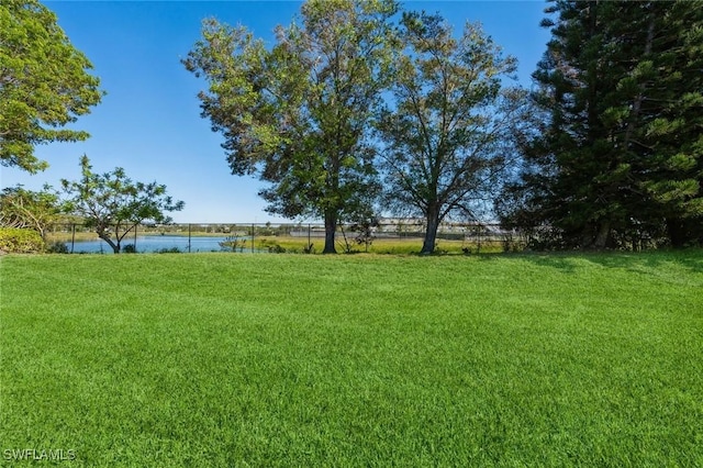 view of yard with a water view